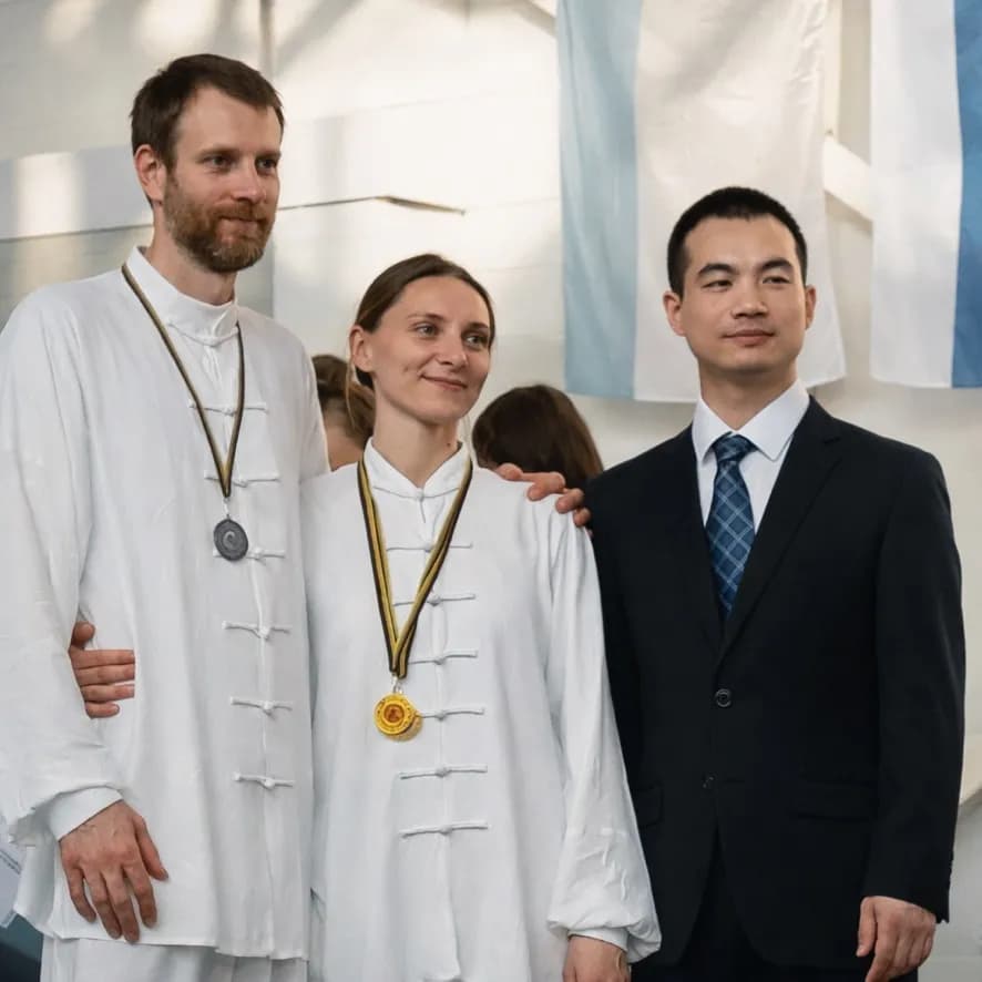 Čempionate su mokytoju Liang Wenming